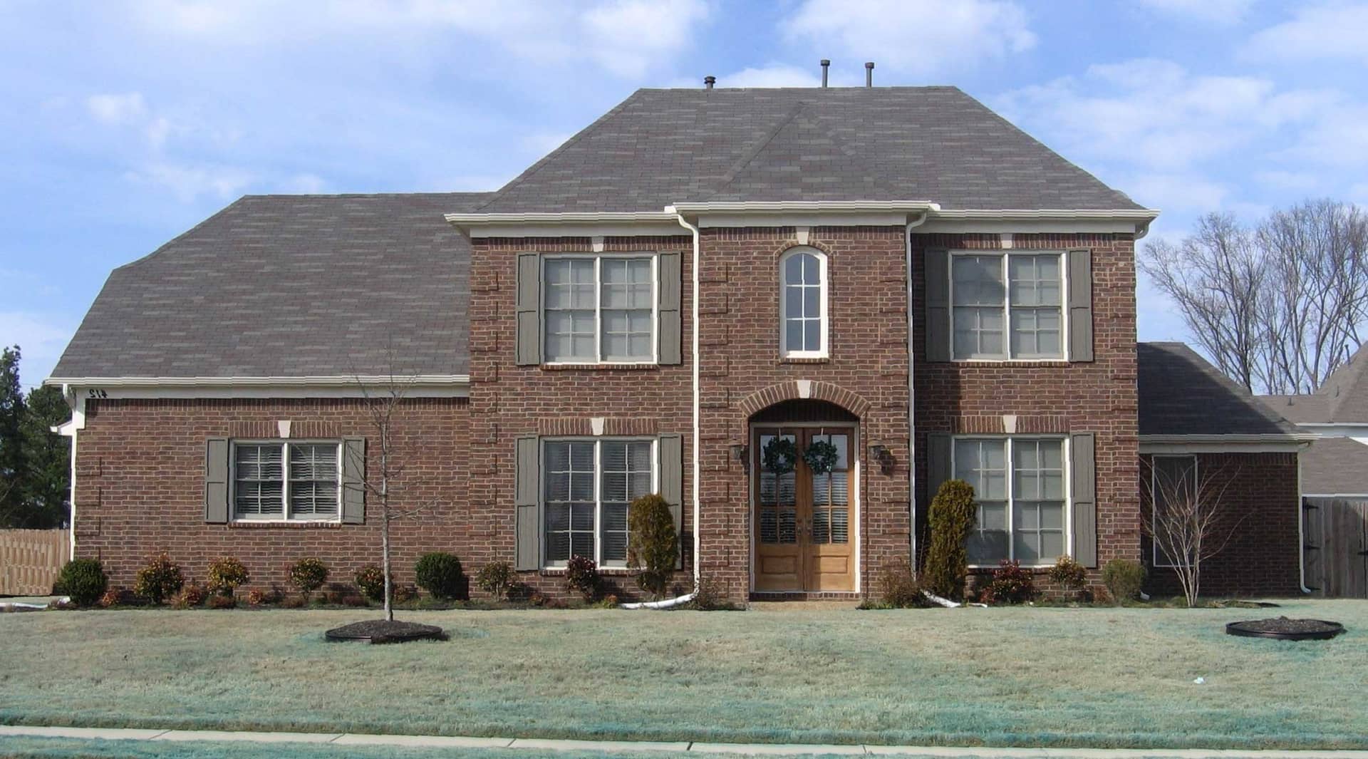 Front view of French home (ThePlanCollection: House Plan #170-1377)