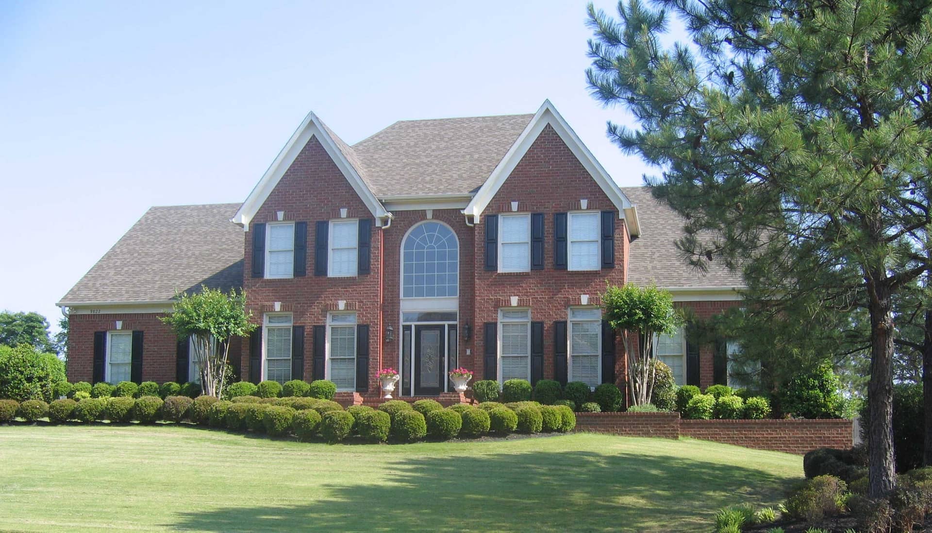 Front view of Luxury home (ThePlanCollection: House Plan #170-1406)