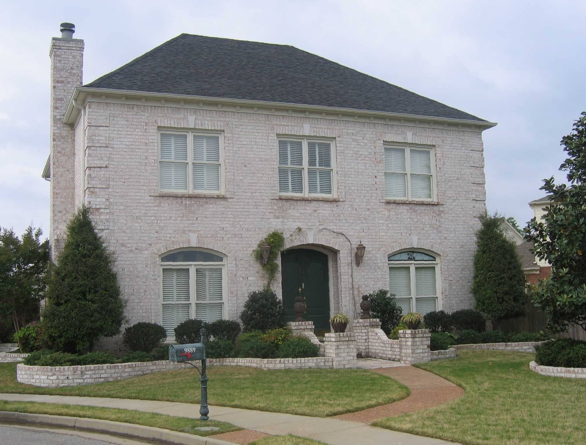 Front view of French home (ThePlanCollection: House Plan #170-1457)