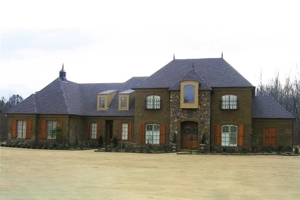 Front view of French home (ThePlanCollection: House Plan #170-1518)
