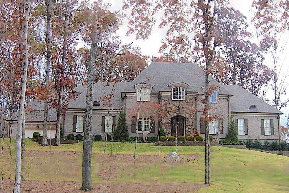Front view of French home (ThePlanCollection: House Plan #170-1543)