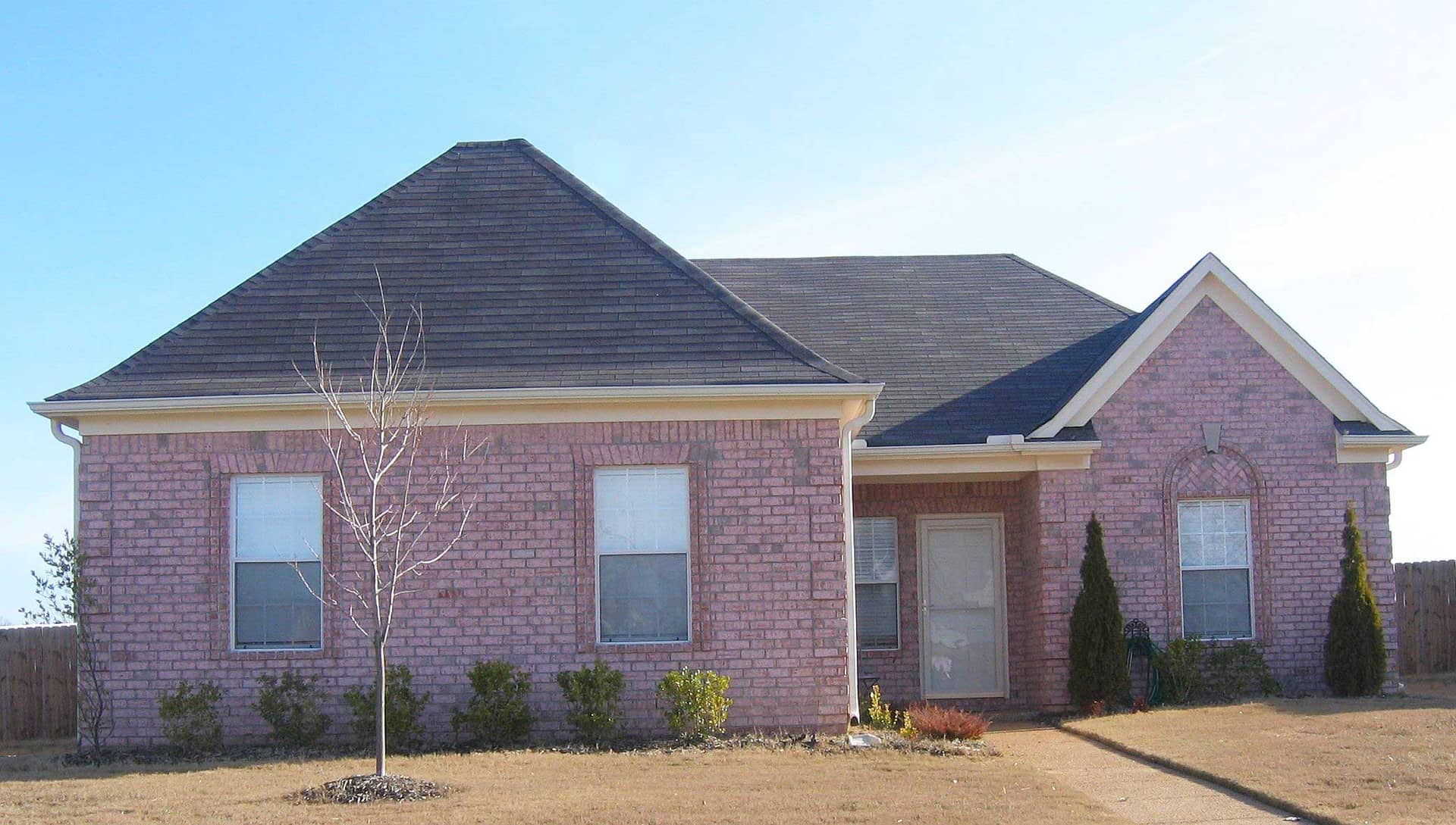 Front view of French home (ThePlanCollection: House Plan #170-1548)