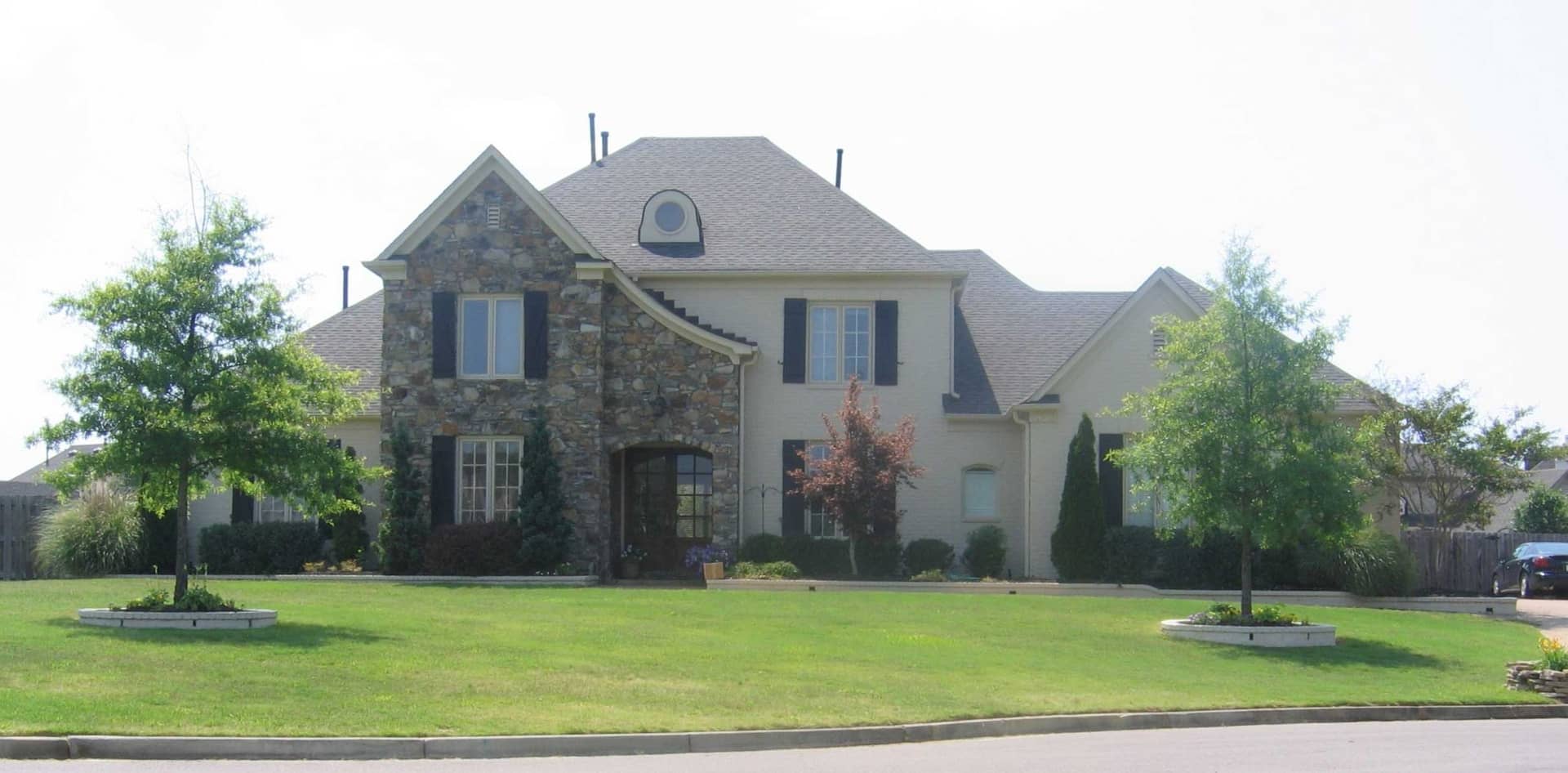 Front view of French home (ThePlanCollection: House Plan #170-1654)