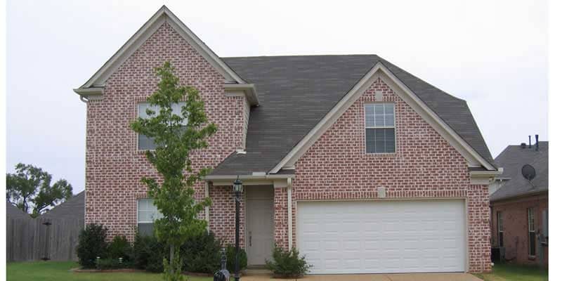 Front view of European home (ThePlanCollection: House Plan #170-1734)