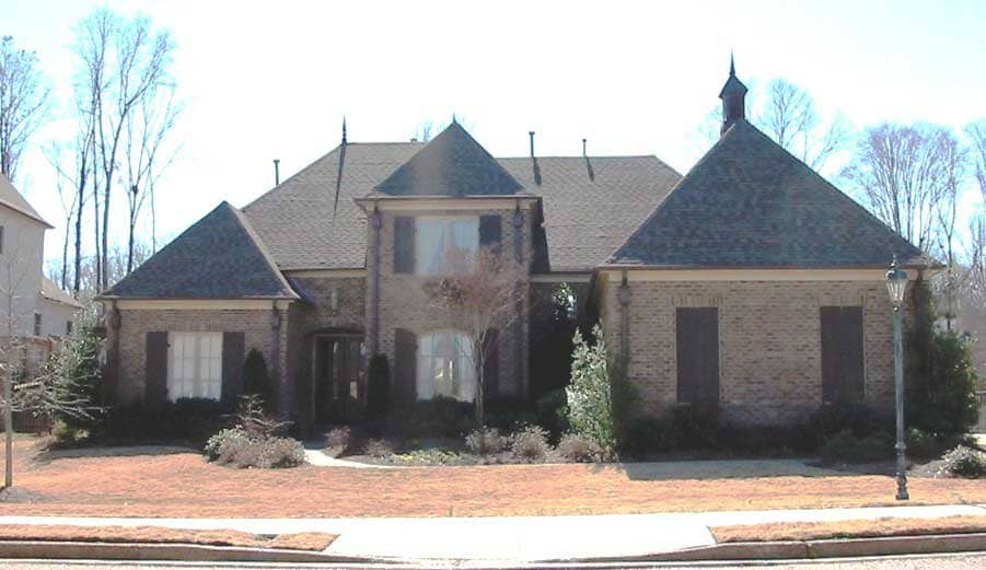 Front view of French home (ThePlanCollection: House Plan #170-1771)