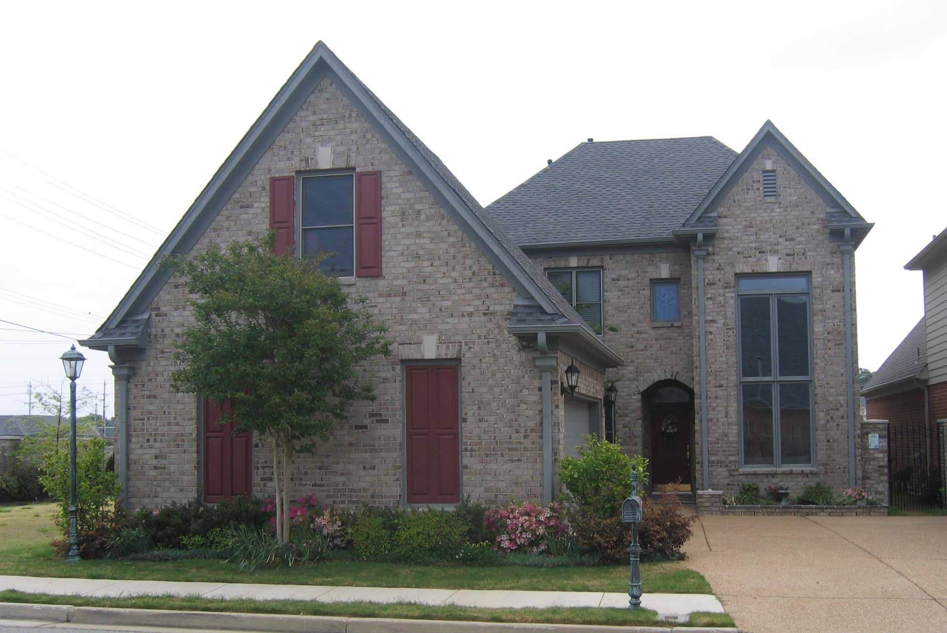 Front view of French home (ThePlanCollection: House Plan #170-1812)