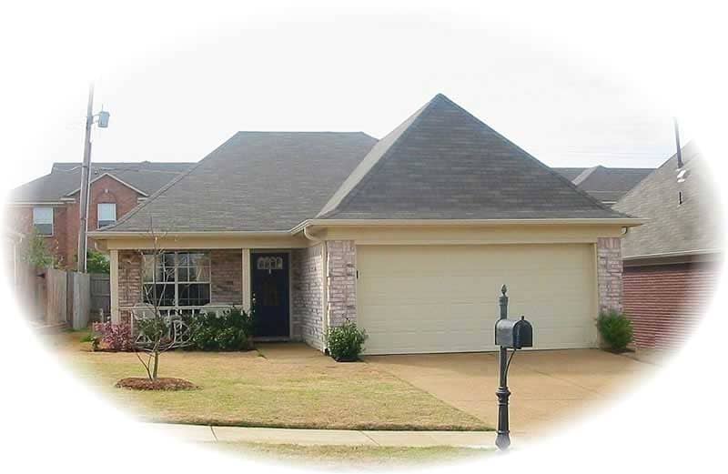 Front view of French home (ThePlanCollection: House Plan #170-2338)