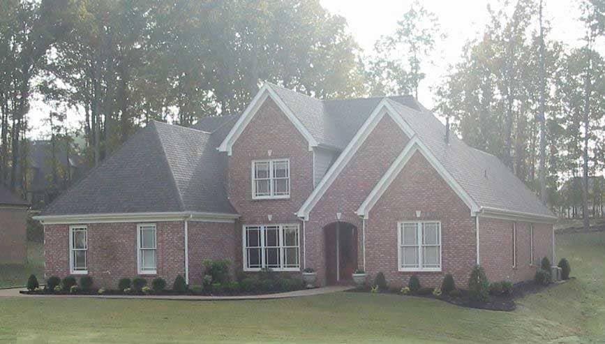 Front view of French home (ThePlanCollection: House Plan #170-2611)