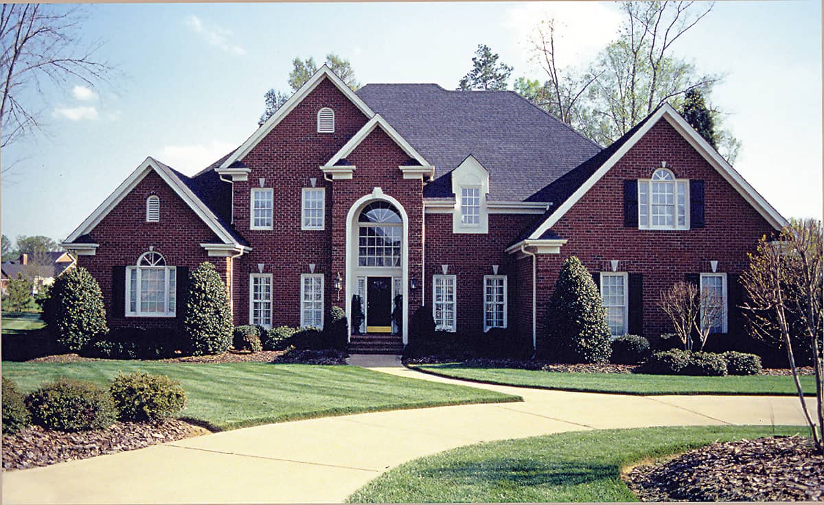 Front elevation of Traditional home (ThePlanCollection: House Plan #180-1016)