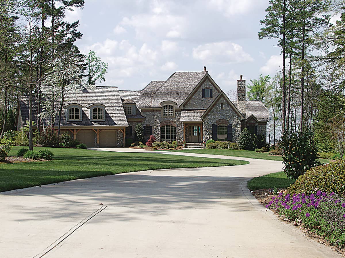 Photo of French Country manor with Arts and Crafts details (ThePlanCollection: House Plan #180-1021)