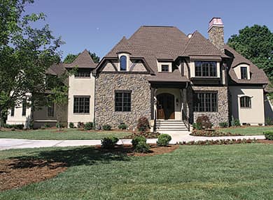 Front elevation of European home (ThePlanCollection: House Plan #180-1029)