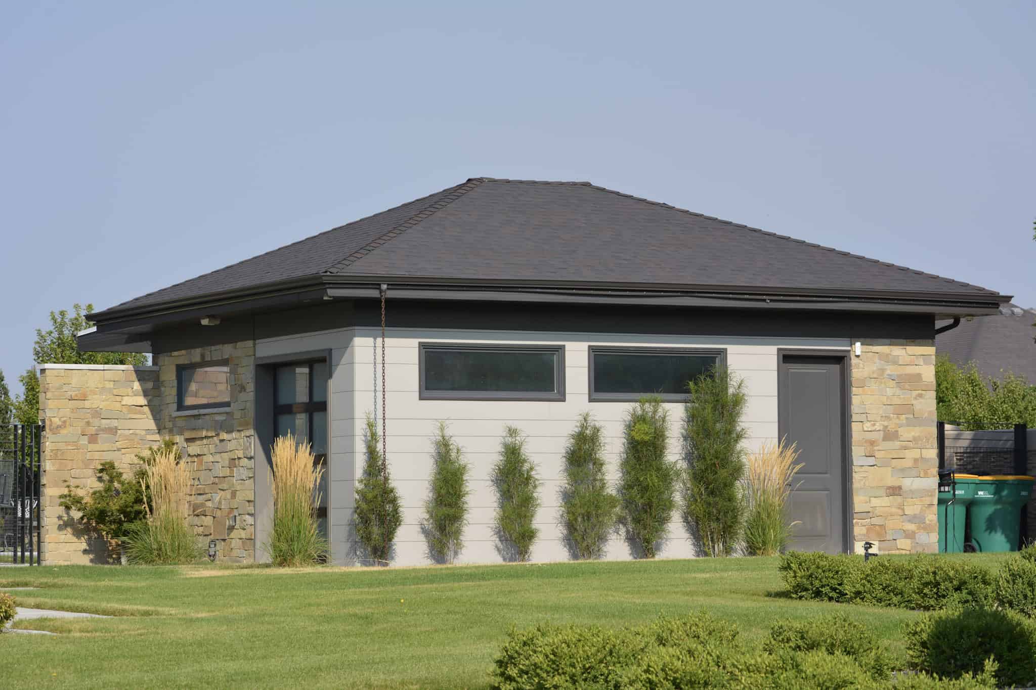 Front elevation of Poolhouse plan (ThePlanCollection: House Plan #187-1218)