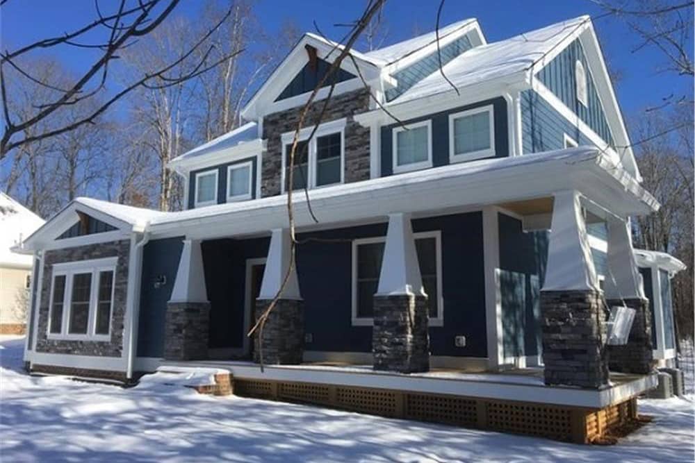 Color photograph of Craftsman home plan (ThePlanCollection: House Plan #189-1093)