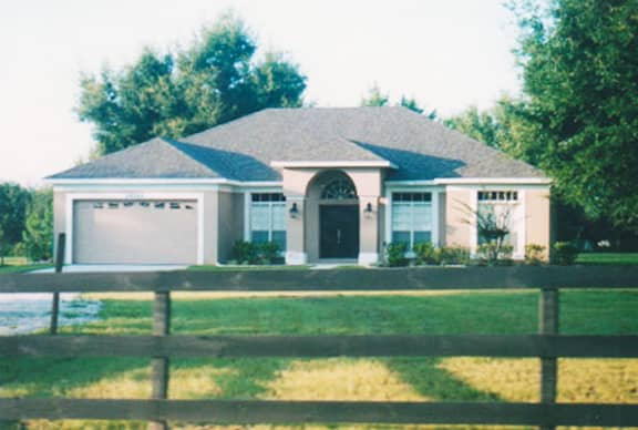 Front elevation of Mediterranean home (ThePlanCollection: House Plan #190-1013)