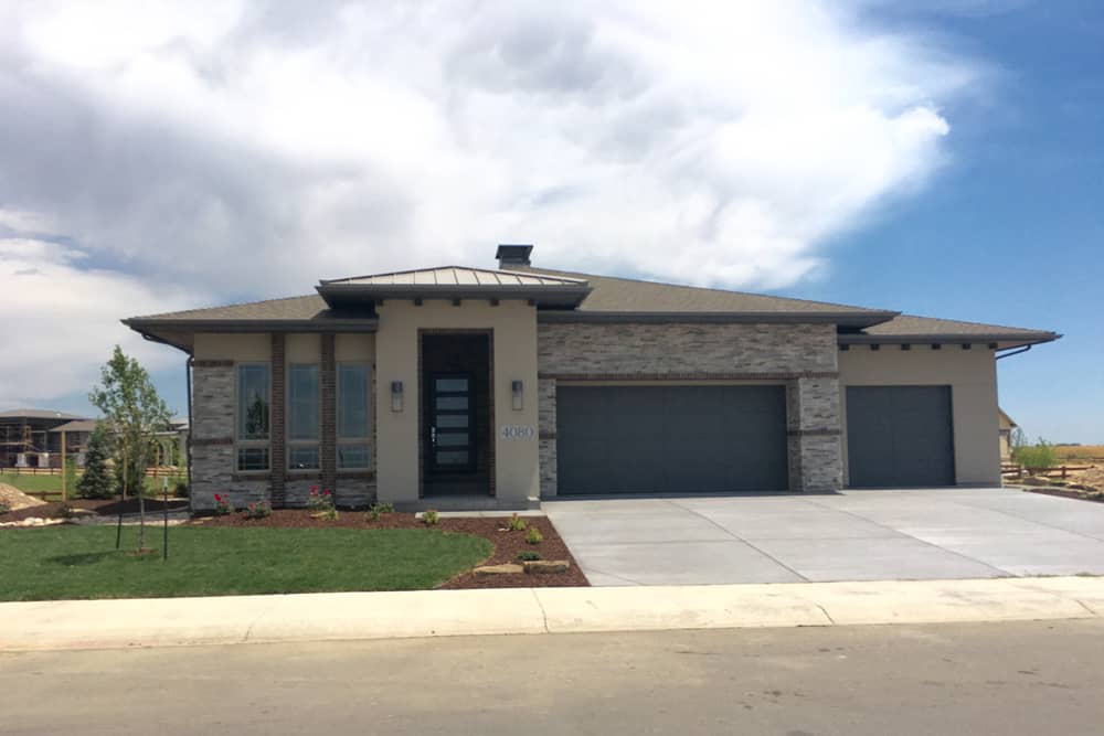 Color photo of Prairie home plan (ThePlanCollection: House Plan #194-1000)