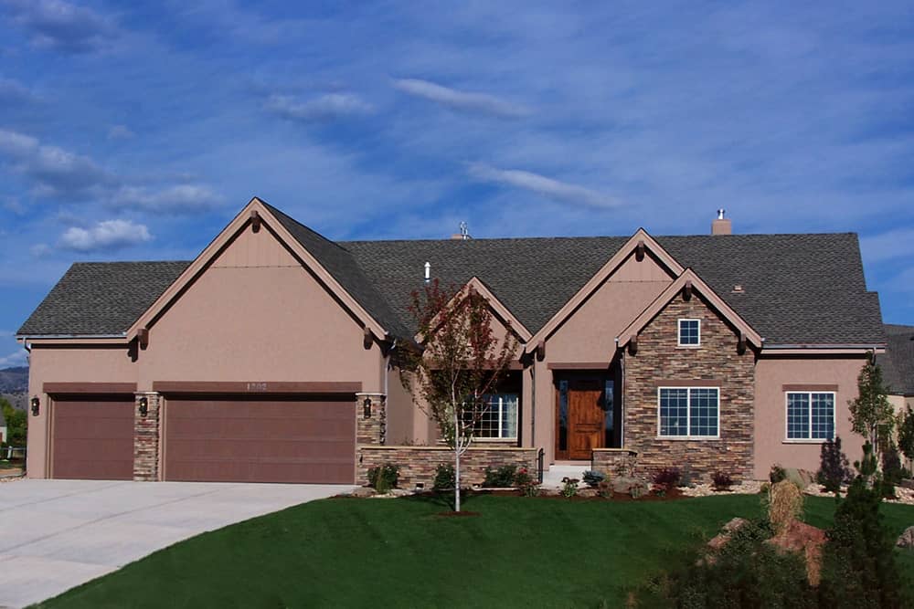 Front elevation of Craftsman home (ThePlanCollection: House Plan #194-1019)