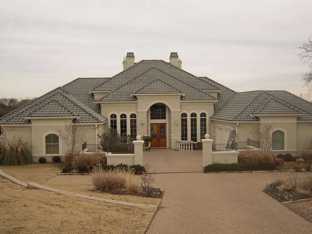 Front elevation of Mediterranean home (ThePlanCollection: House Plan #195-1052)