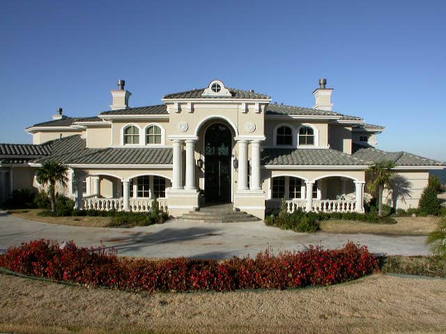 Front elevation of Mediterranean home (ThePlanCollection: House Plan #195-1077)