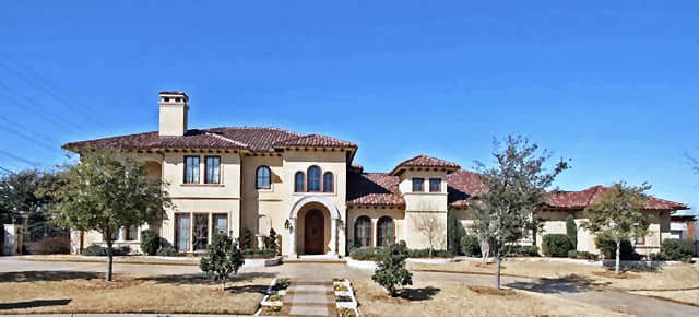 Front elevation of Mediterranean home (ThePlanCollection: House Plan #195-1126)