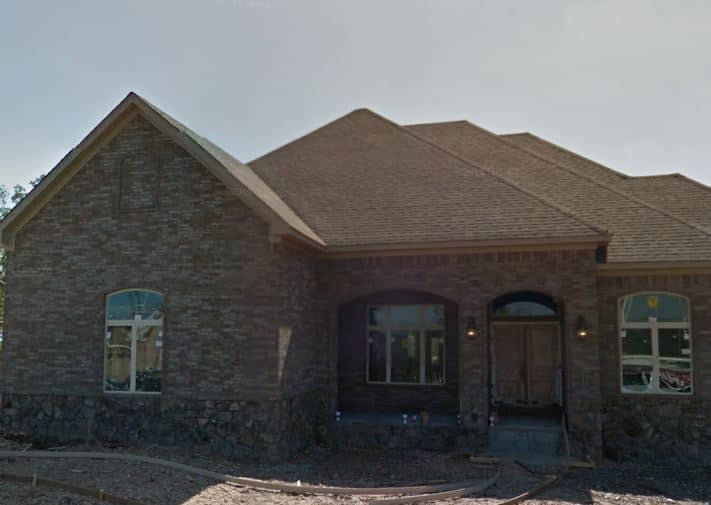 Front elevation of Craftsman home (ThePlanCollection: House Plan #195-1158)