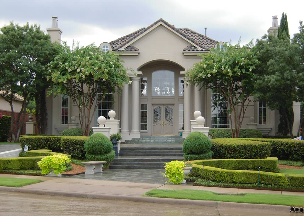 Front elevation of Luxury home (ThePlanCollection: House Plan #195-1165)