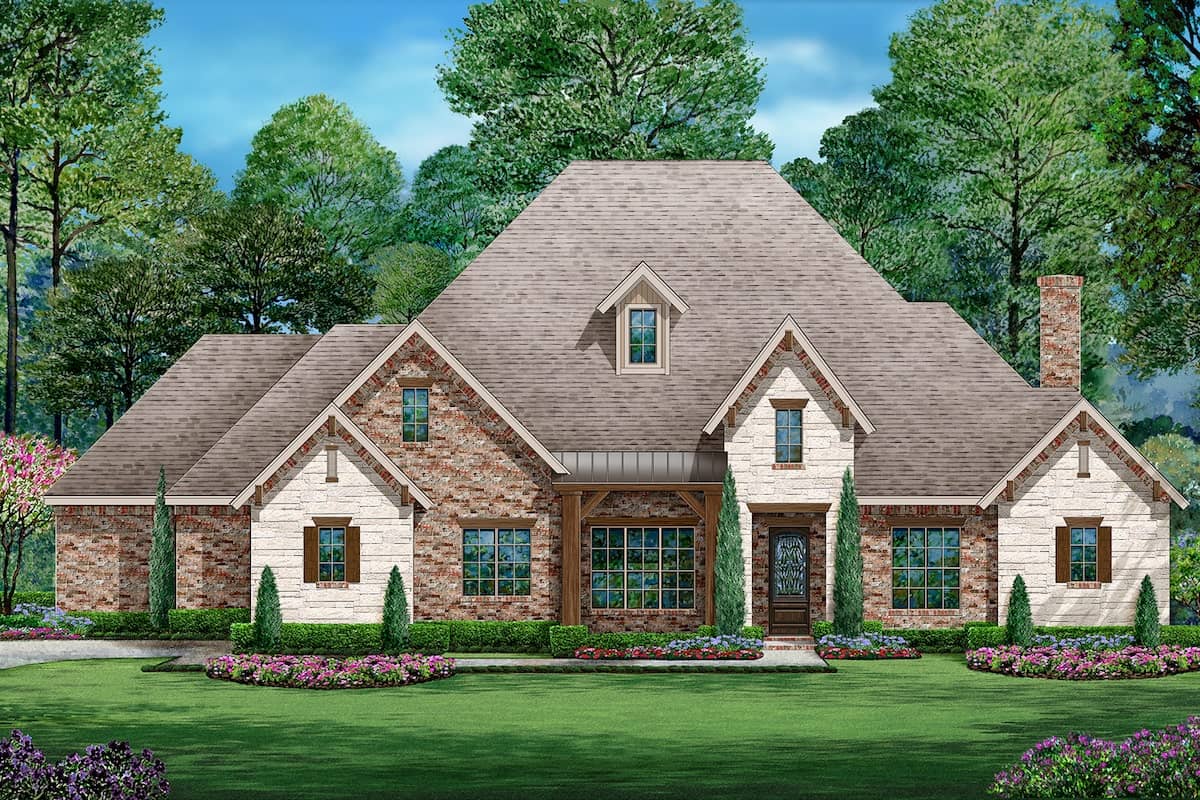 Front elevation of Tudor home (ThePlanCollection: House Plan #195-1201)