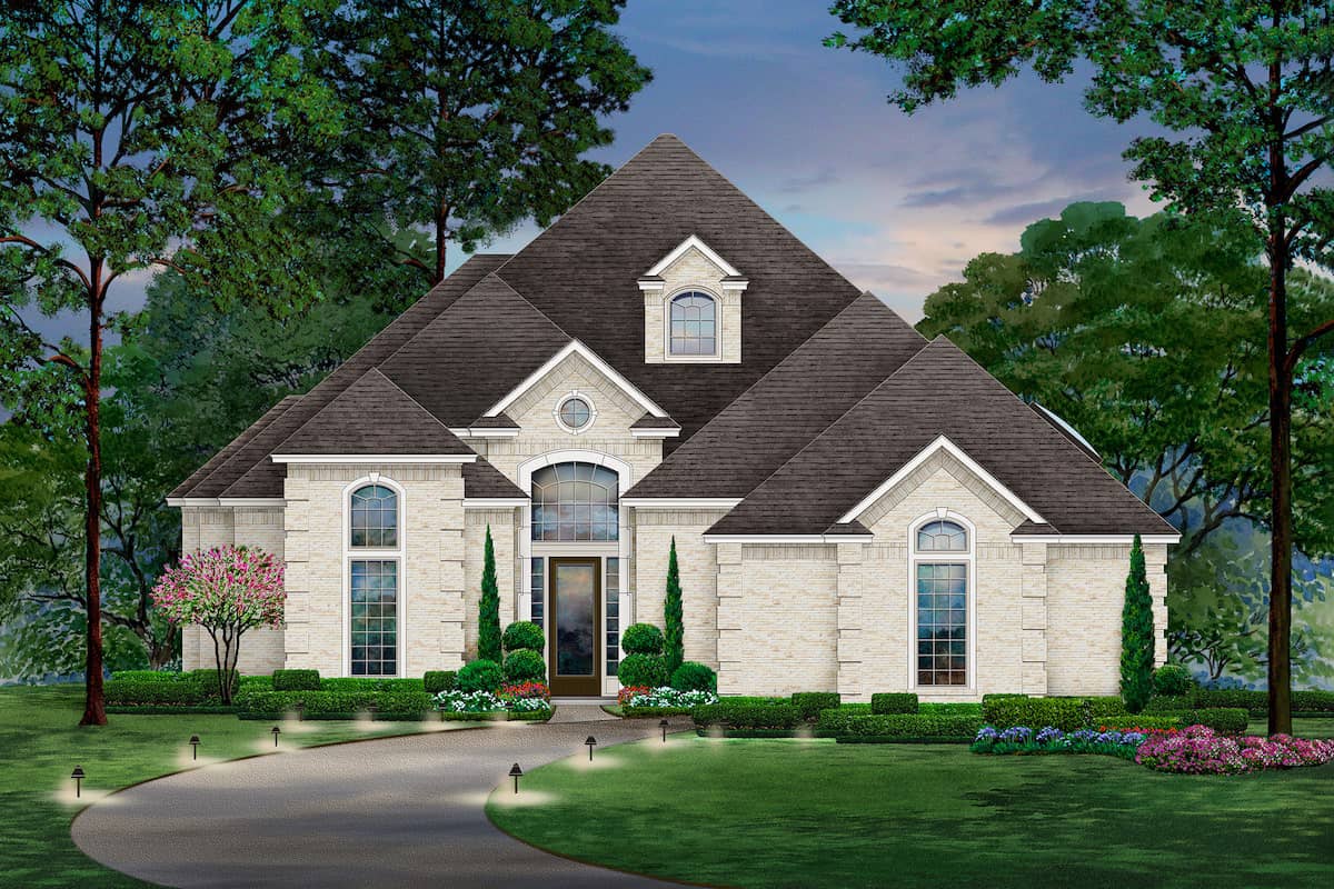 Front elevation of Tudor home (ThePlanCollection: House Plan #195-1208)