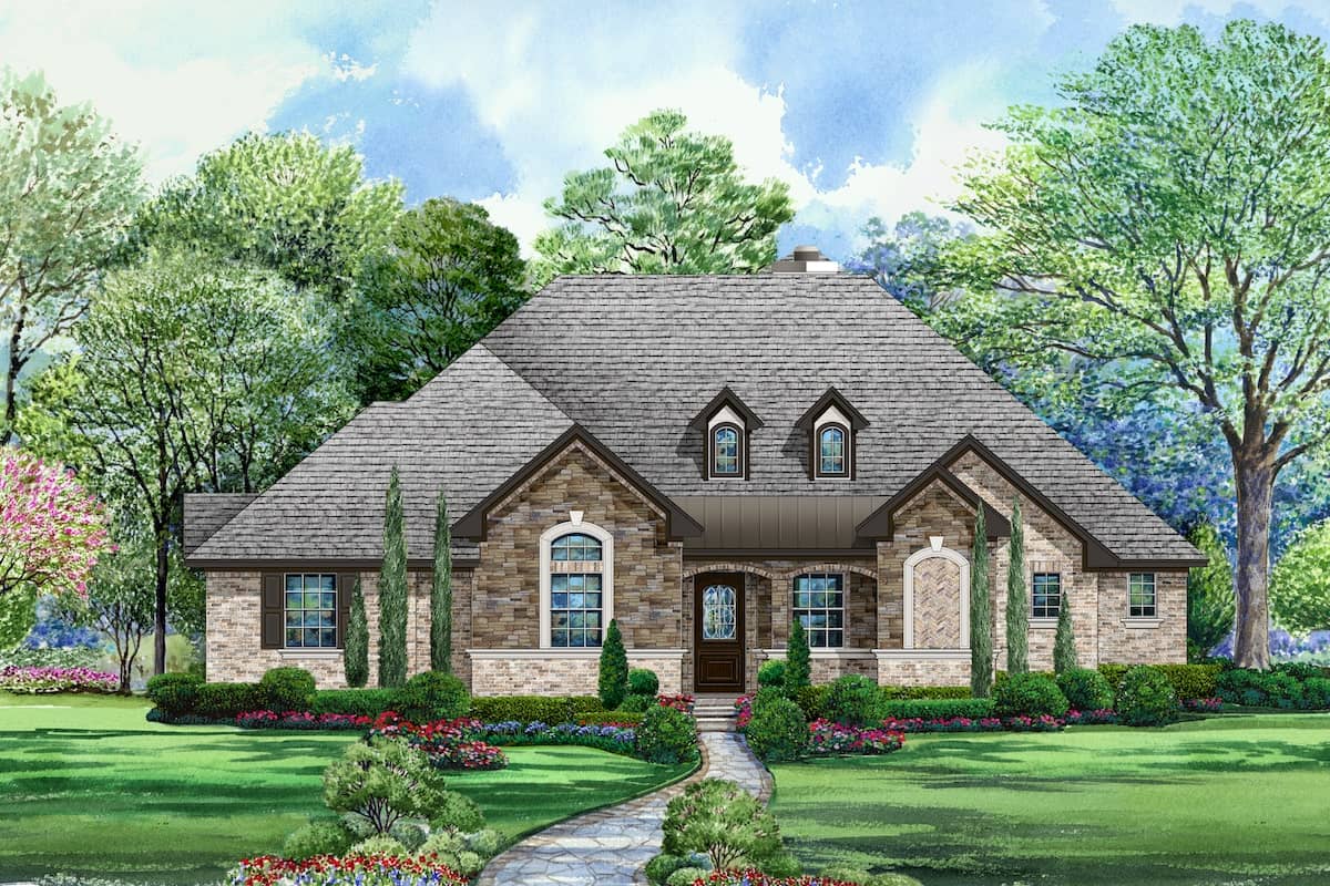 Front elevation of Tudor home (ThePlanCollection: House Plan #195-1212)