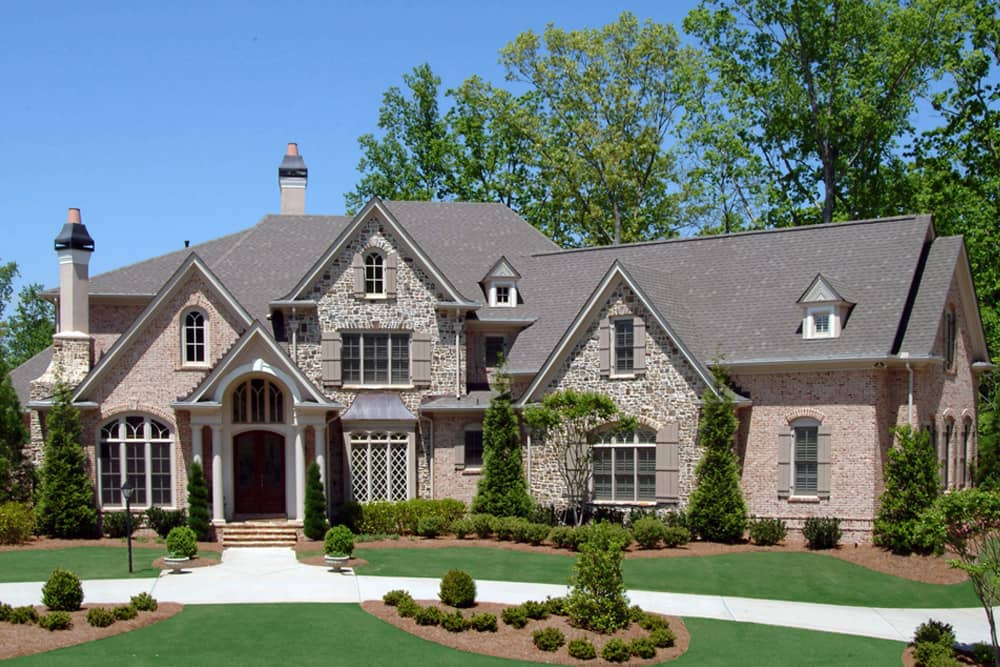 Color photograph of European home plan (ThePlanCollection: House Plan #198-1002)