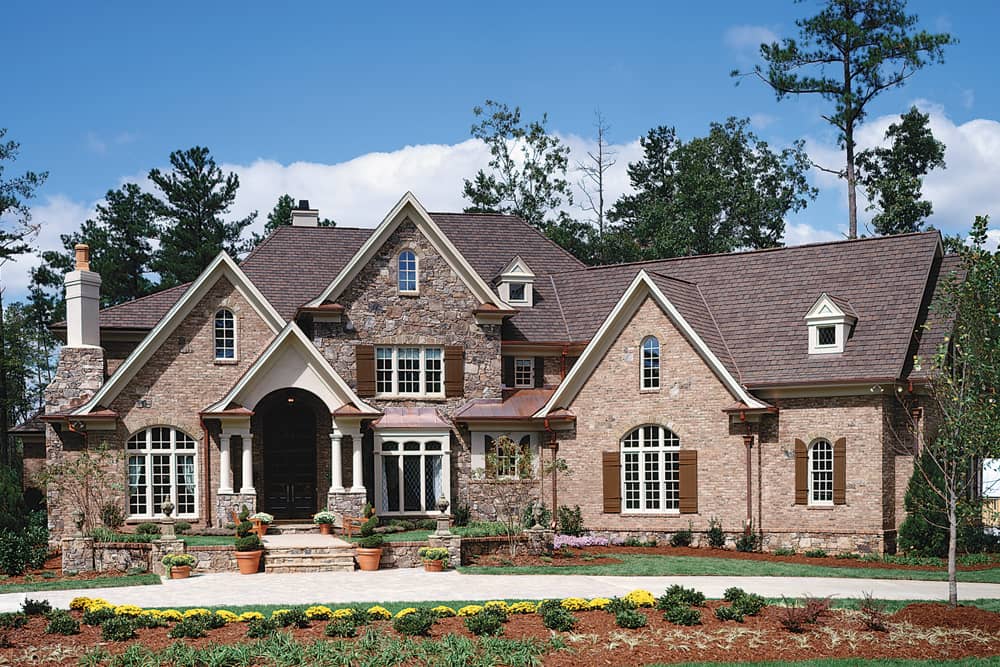 Color photograph of European home plan (ThePlanCollection: House Plan #198-1003)