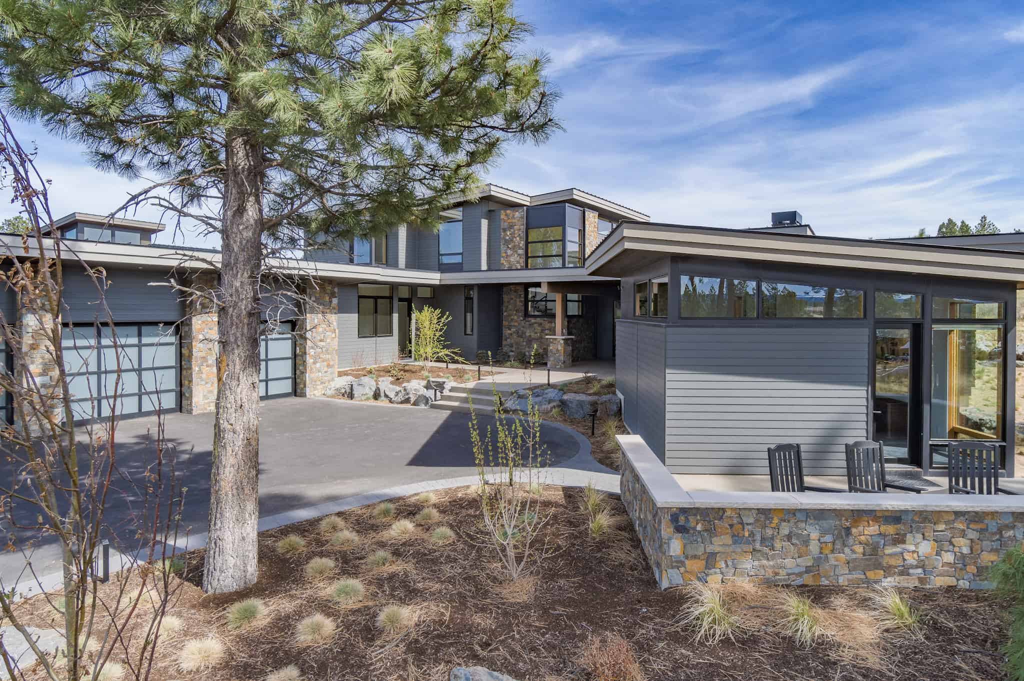 Front elevation of Contemporary home (ThePlanCollection: House Plan #202-1036)