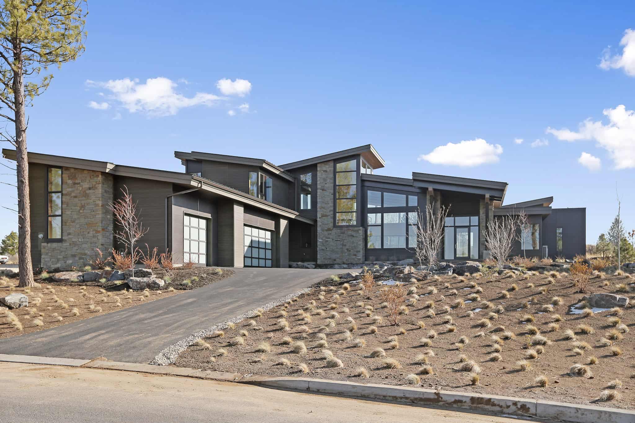 Front elevation of Contemporary home (ThePlanCollection: House Plan #202-1037)