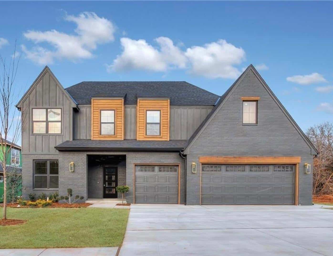 Front elevation of Modern Farmhouse home (ThePlanCollection: House Plan #212-1008)