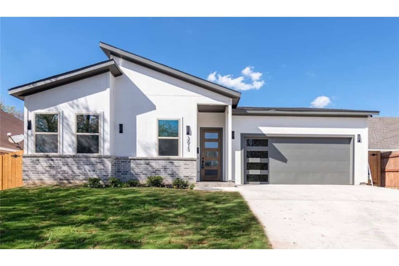 Front elevation of Modern home (ThePlanCollection: House Plan #223-1013)