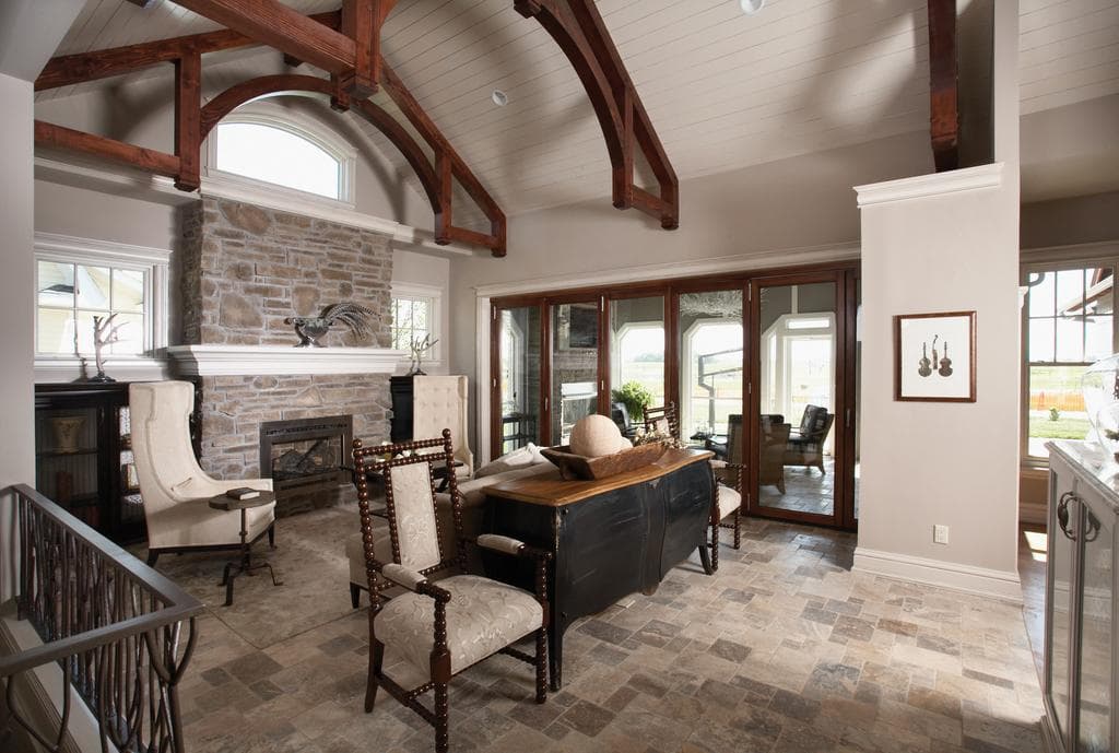A cathedral ceiling follows the roofline above this great room.