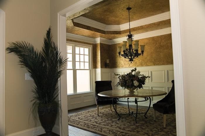 Crown molding softens the transition between the wall and ceiling.