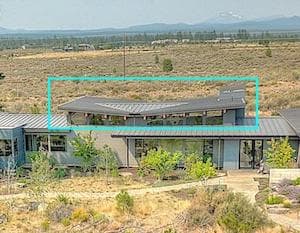 The outlined roof planes show the gull wing profile on this mid-century modern home.