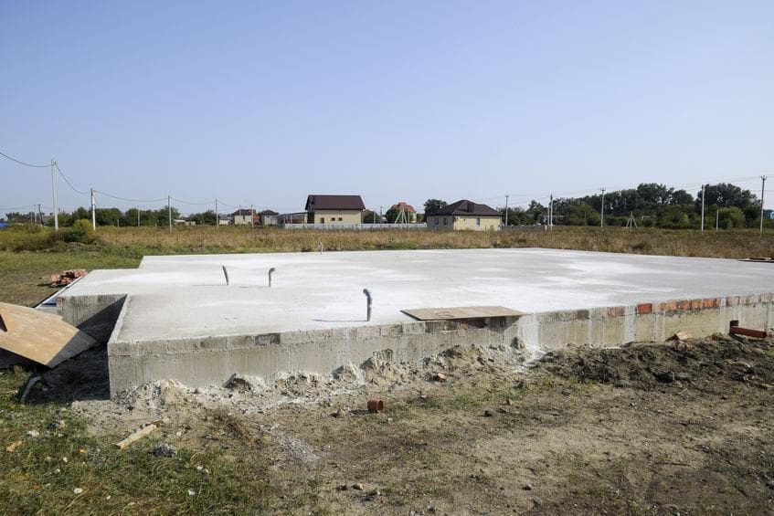 A monolithic slab foundation with a thickened perimeter edge.