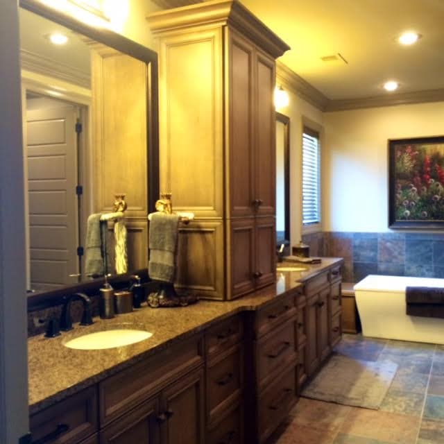 A wall cabinet mounted above a base cabinet.