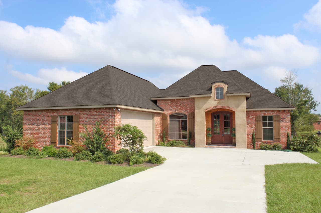 3-Bedroom, 1952 Sq Ft Acadian Home Plan - 142-1090 - Main Exterior