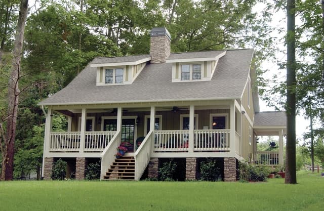 Color photograph of Farmhouse / Country home plan #153-1871