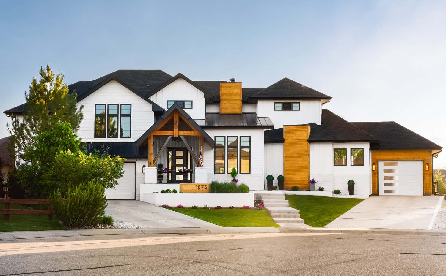 Front elevation of Luxury home (ThePlanCollection: House Plan #161-1188)