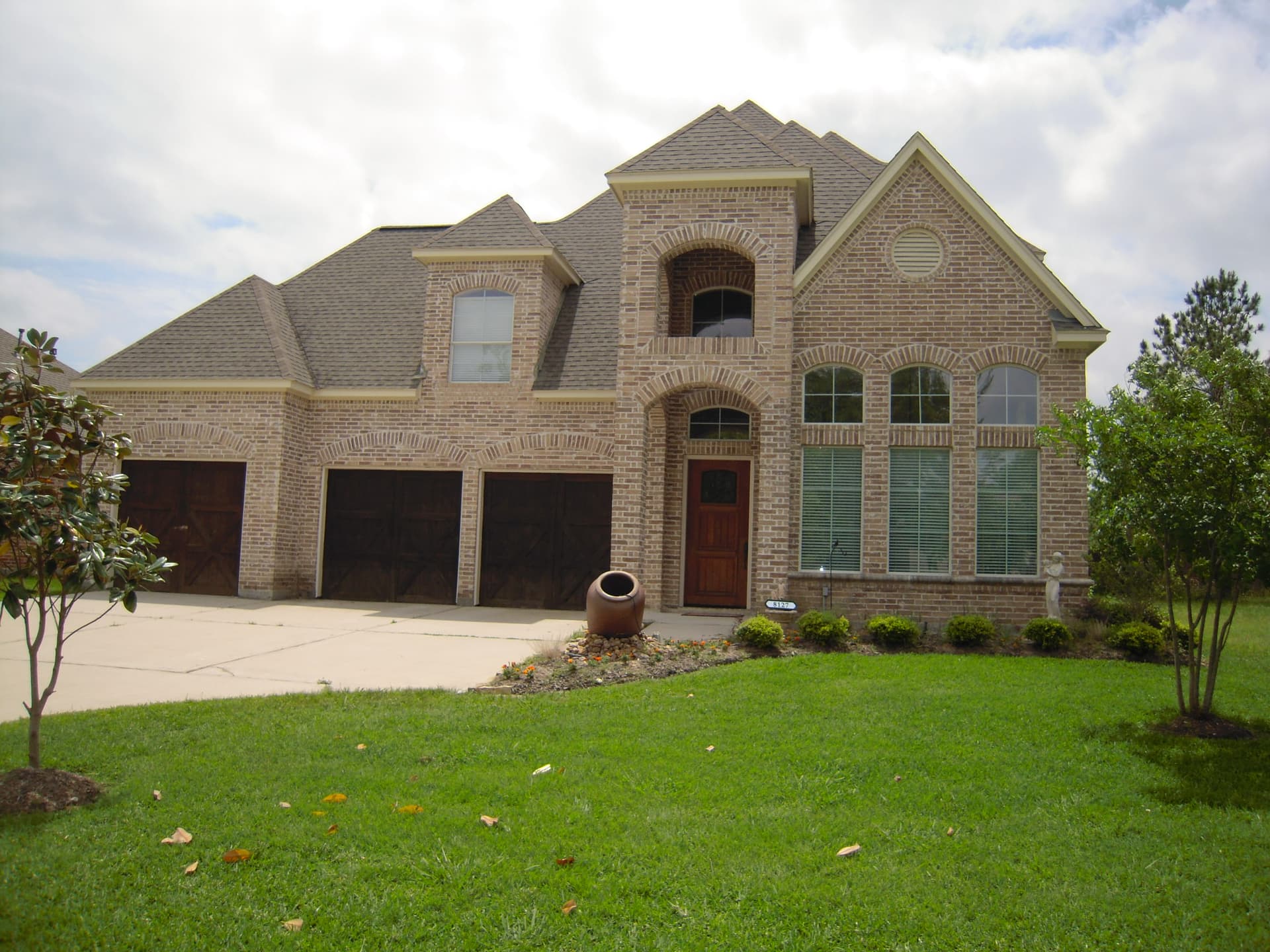 3-Bedroom, 3944 Sq Ft Luxury House Plan - 195-1007 - Front Exterior