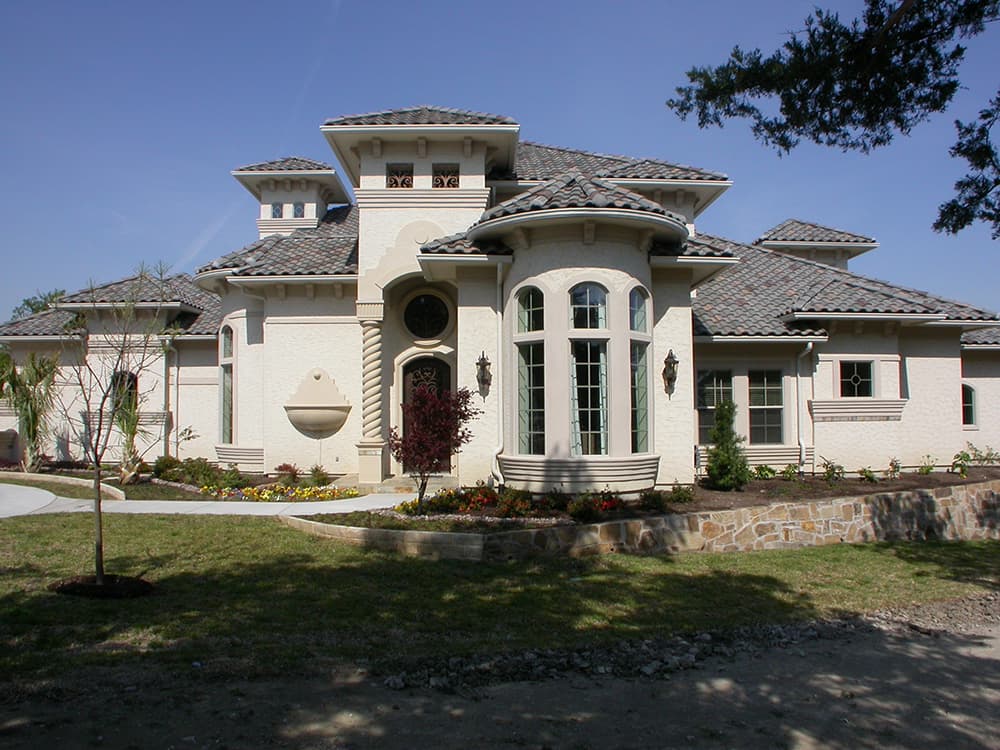 Front elevation of Mediterranean home (ThePlanCollection: House Plan #195-1070)