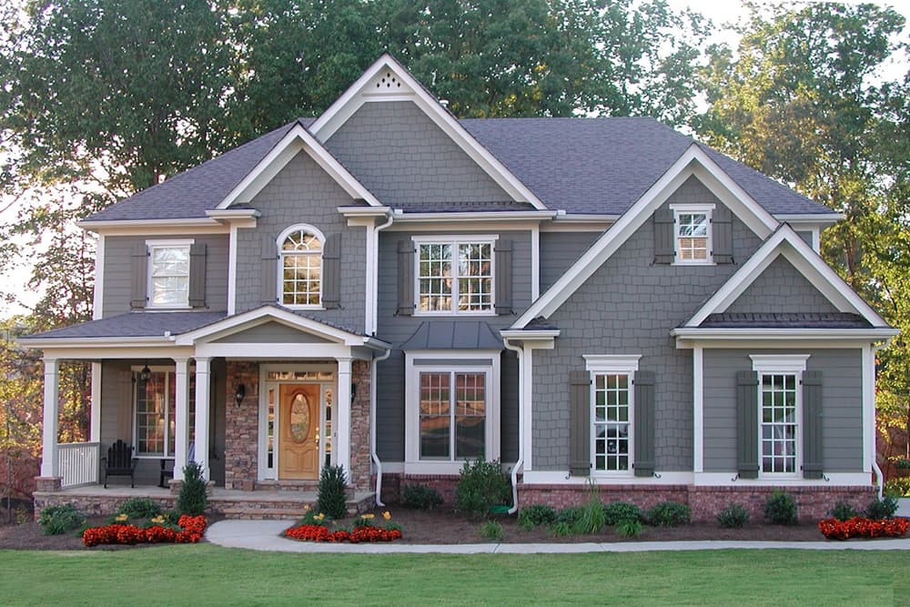 Color photograph of Traditional home plan (ThePlanCollection: House Plan #198-1020)