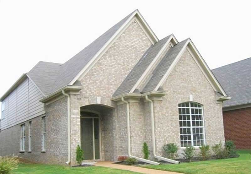Front view of European home (ThePlanCollection: House Plan #170-1263)