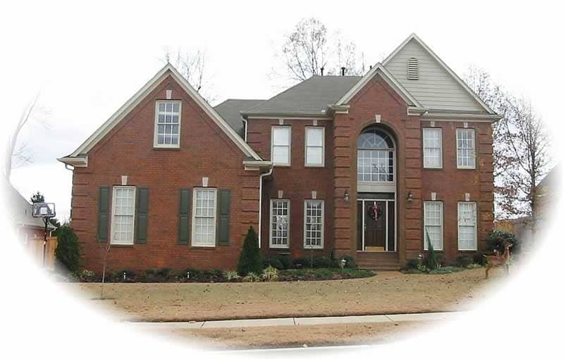 Front view of French home (ThePlanCollection: House Plan #170-2057)
