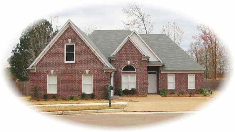 Front view of French home (ThePlanCollection: House Plan #170-2164)