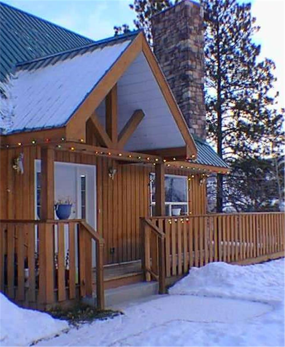 Front porch of 2-story, 2-bedroom vacation retreat house